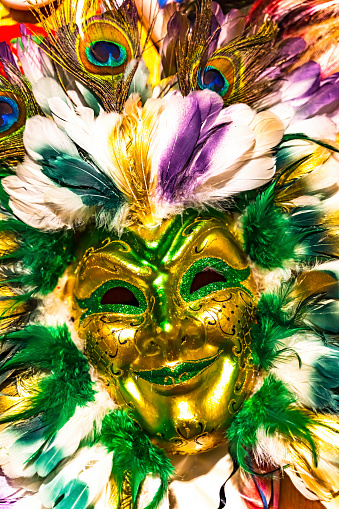 Colorful Green Gold Mask Feathers New Orleans Louisiana.  Masks worn at Mardi Gras.