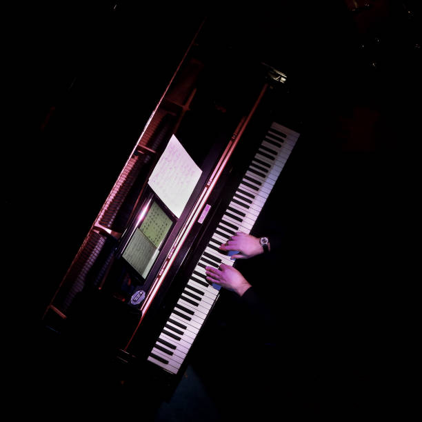 istock Piano Top-Down on black with sheet music 1224740849