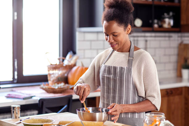 istock Woman prepare pie in the kitchen 1224744374