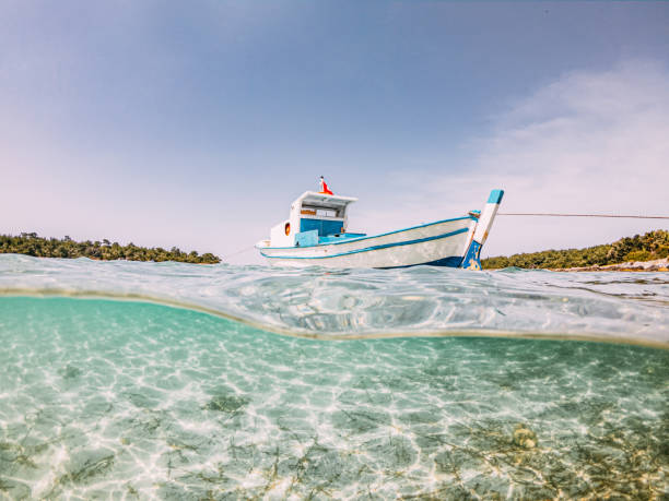 istock Half Underwater View Fishing Boat 1224746442