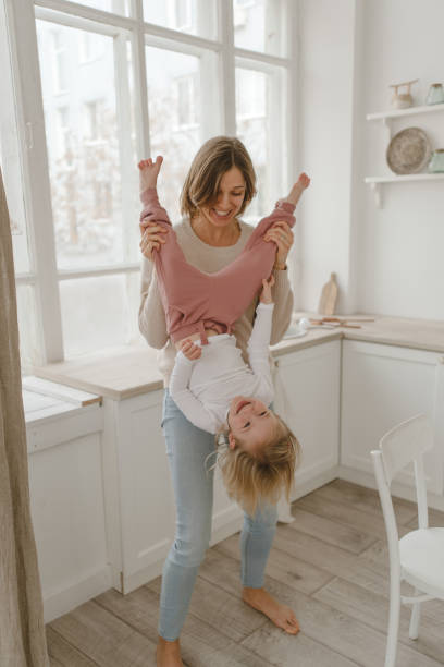 istock A young mother spends time with her little daughter at home. 1224747549