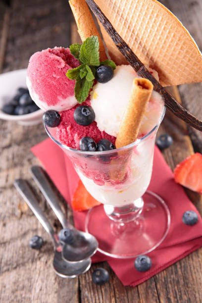 istock blueberry ice cream and strawberry with biscuit 1224752870