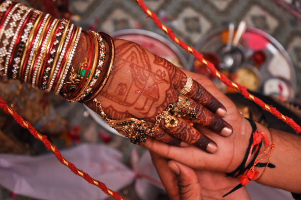 istock Indian couple's hand in hand in a wedding 1224754024