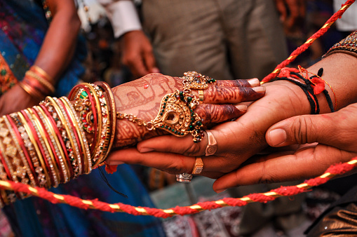Indian couple's hand in hand in a wedding, Indian marriage