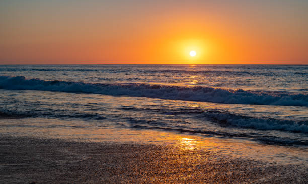 istock Colorful sunset over the deep blue sea 1224757773