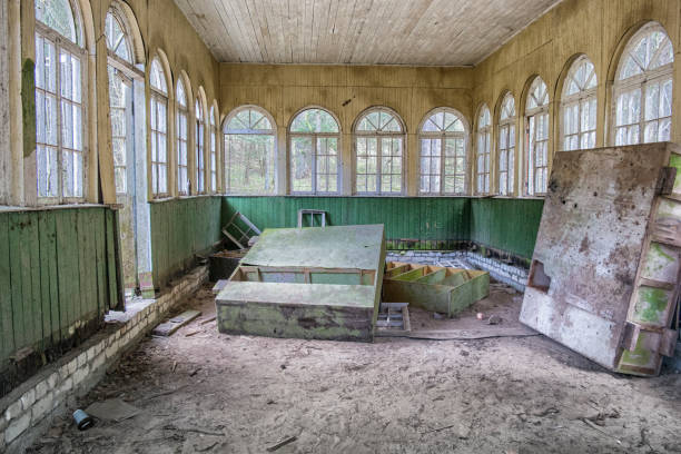 istock Corridor in an old abandoned building. 1224758930