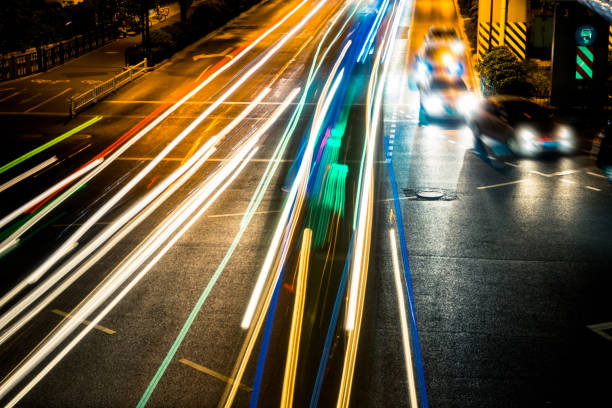 istock moving car with blur light through city at night 1224760644