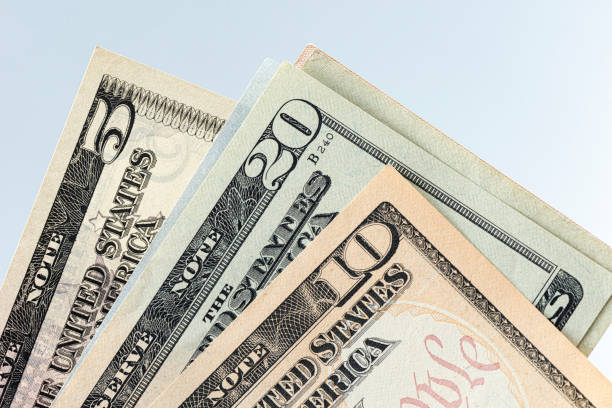 istock Many american dollar banknotes. 1224762168