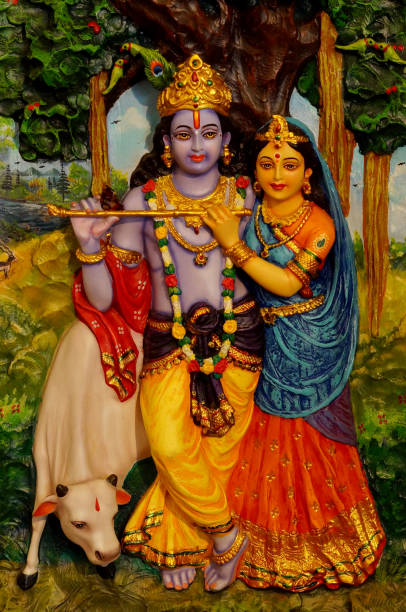 Close-up of wall art of Hindu Godd and Goddess Krishna and Radha wall art of Hindu God and Goddess Krishna and Radha in a temple radha krishna stock pictures, royalty-free photos & images