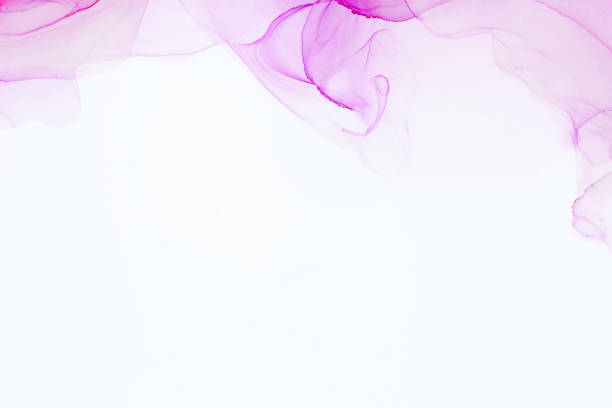 Abstract colorful alcohol ink color pink rose tone on white background. Abstract artwork. Trendy wallpaper.