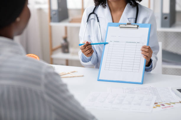 istock Dietician showing female patient treatment plan, cropped 1224770166