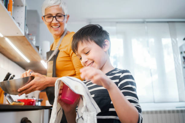 istock Family washing dishes 1224770914