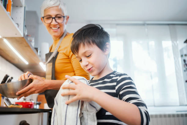 istock Family washing dishes 1224770917