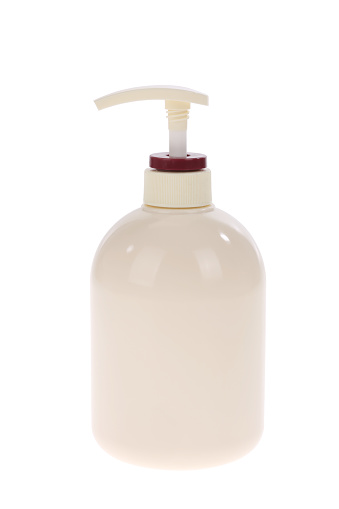 empty shampoo bottle on white background