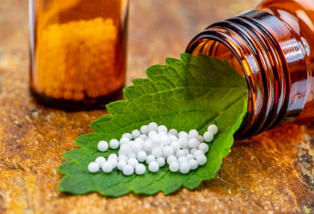 istock alternative and natural medicine with herbal pills 1224772888