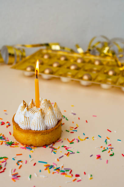 istock Cake with white cream and a candle 1224773978