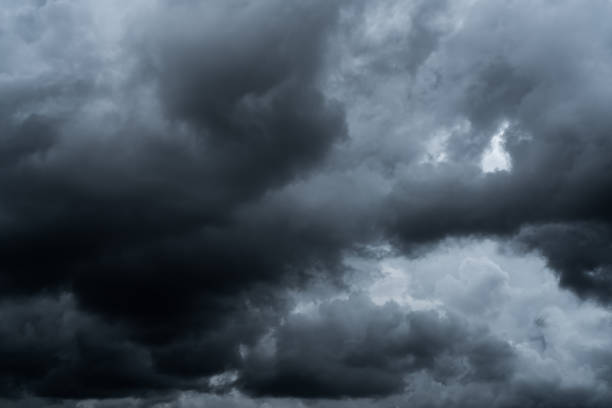 istock Dark dramatic sky and clouds. Background for death and sad concept. Gray sky and fluffy white clouds. Thunder and storm sky. Sad and moody sky. Nature background. Dead abstract background. Cloudscape. 1224774402