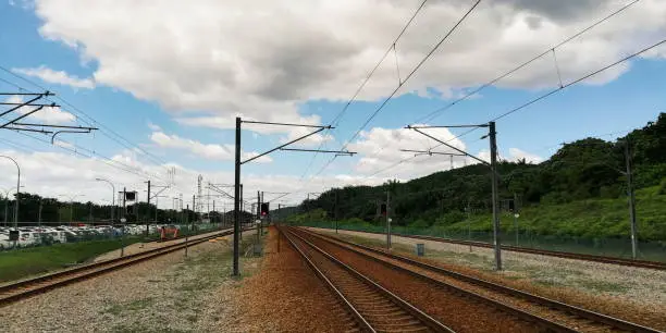 White cloud is accompany with the railroad.