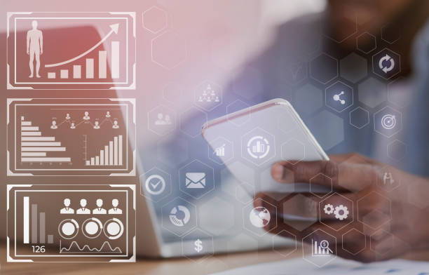 istock Unrecognizable black HR manager using smartphone and working on laptop 1224776207