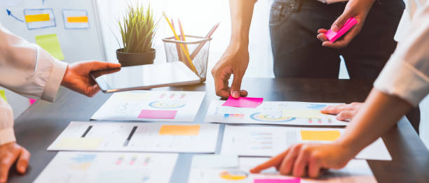 istock Teamwork Brainstorming Meeting and new startup project in workplace, Quality successful work concept, vintage effect. 1224779423
