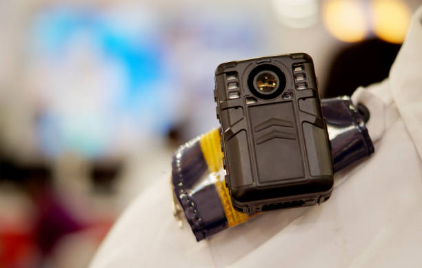 Close-up of a Body cam, audio/video recording equipment on Police officer stock photo