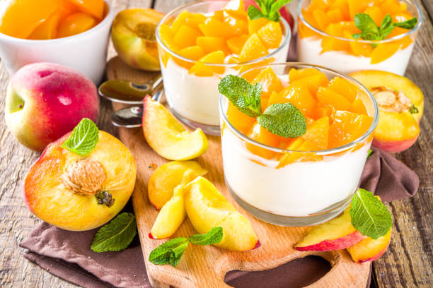 istock Curd or yogurt dessert with peaches 1224782948