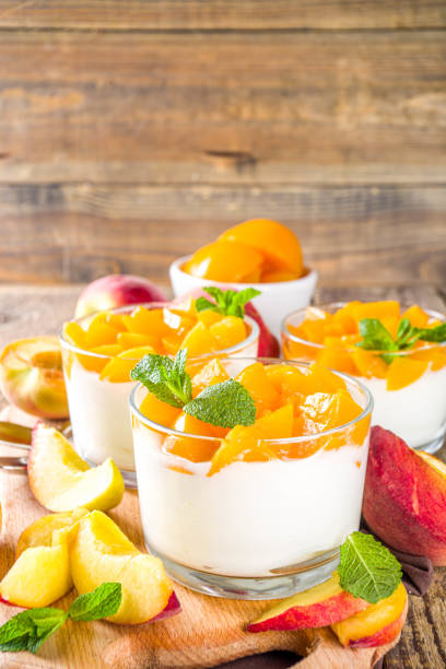 istock Curd or yogurt dessert with peaches 1224783043