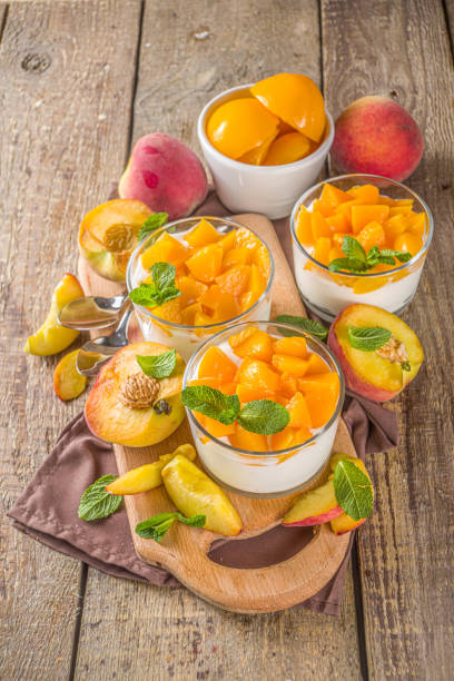istock Curd or yogurt dessert with peaches 1224783069