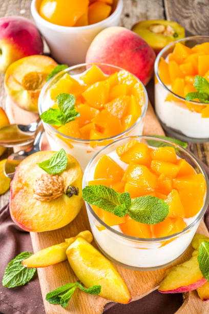 istock Curd or yogurt dessert with peaches 1224783115