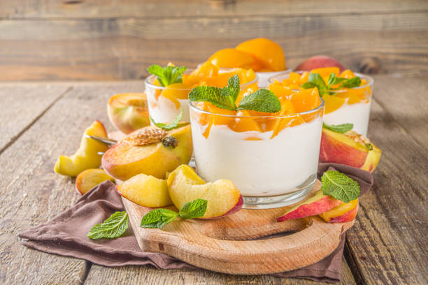 istock Curd or yogurt dessert with peaches 1224783124