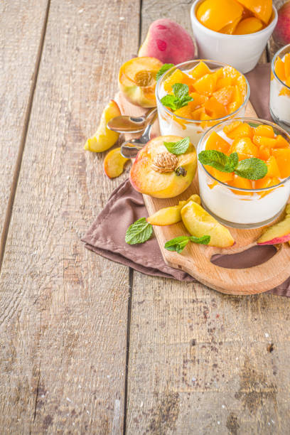 istock Curd or yogurt dessert with peaches 1224783149