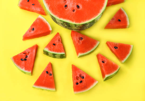 istock Watermelon pattern and Sliced watermelon on yellow background 1224783877