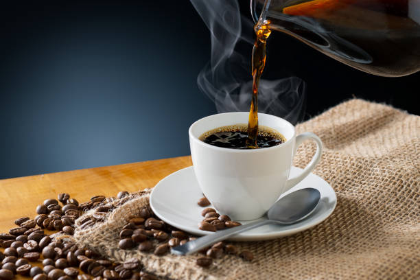 istock Cup of coffee and coffee beans on burlap sack. 1224784908