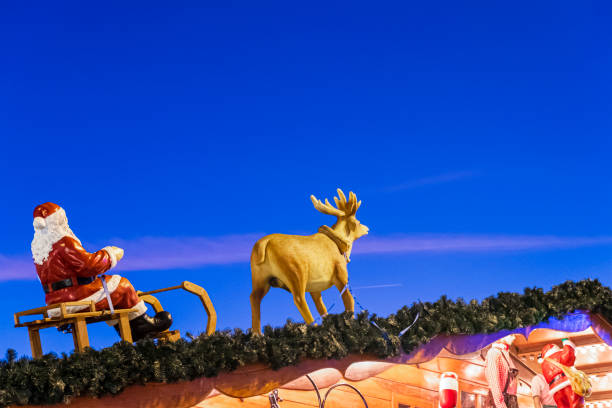istock Santa Claus on reindeer sleigh (Leeds, UK) 1224786597