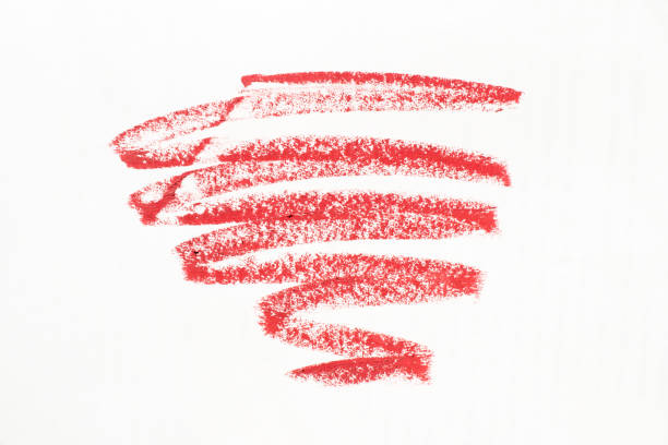 istock Smudged red lipstick isolated on white background 1224786615