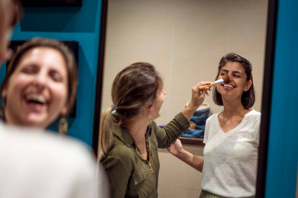 istock Beautiful young women getting ready for night out 1224788278
