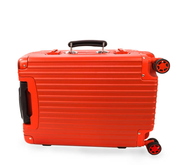istock Red large polycarbonate travel plastic suitcase with wheels isolated on background 1224789444