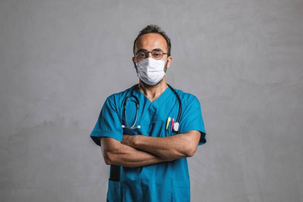 istock Male Doctor in Surgical Mask 1224792183