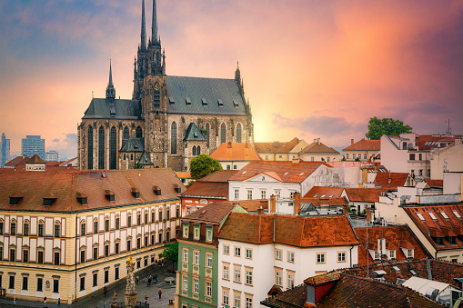 Centre of the old town of Brno - The Cathedral of Saints Peter and Paul (Katedrála svatých Petra a Pavla) and The Cabbage Market in dramatic sunset.