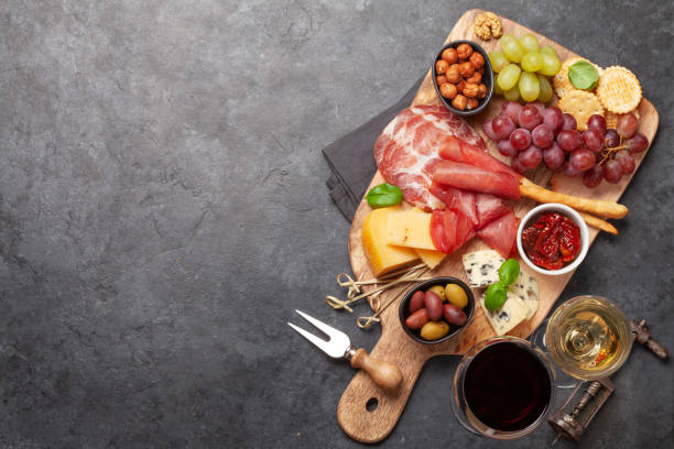 istock Cheese, meat, grapes and olives antipasto 1224795970