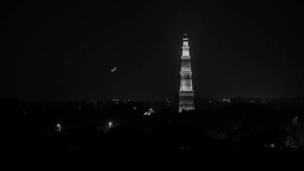 Qutub Minar and the moon