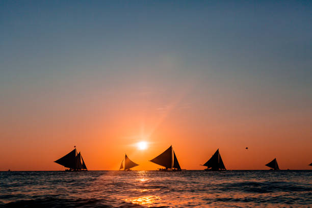 istock Boracay island - sailing boats in sunset. 1224796488