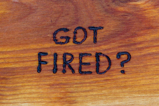 istock question got fired handwritten with hand woodburner on flat brown wood surface 1224797850
