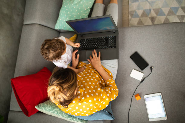 istock Mother enjoying spending time with her son while working at home 1224797946