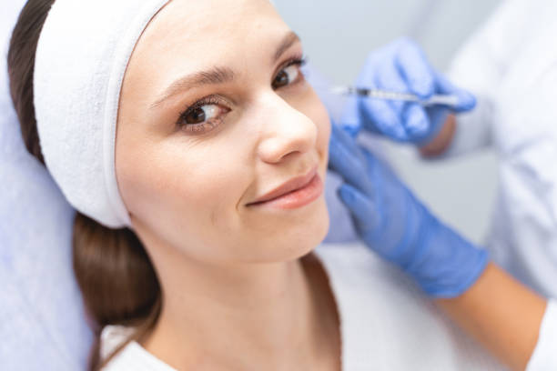 istock Woman posing for the camera during a cosmetic procedure 1224798876