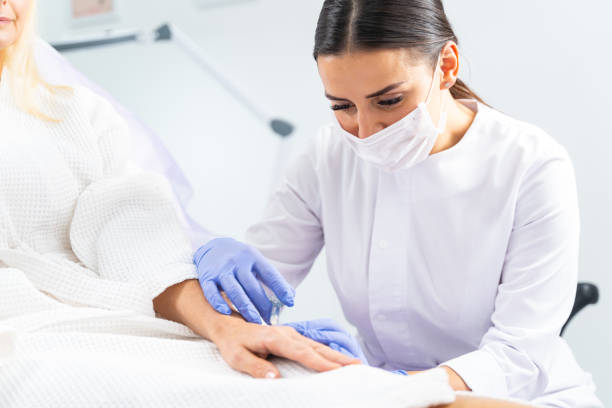 istock Female patient undergoing a skin rejuvenating treatment 1224798886