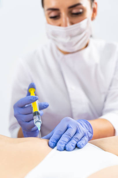 istock Caucasian female undergoing a fat reduction treatment 1224799063