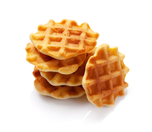 istock Delicious belgian waffles isolated on white 1224799373