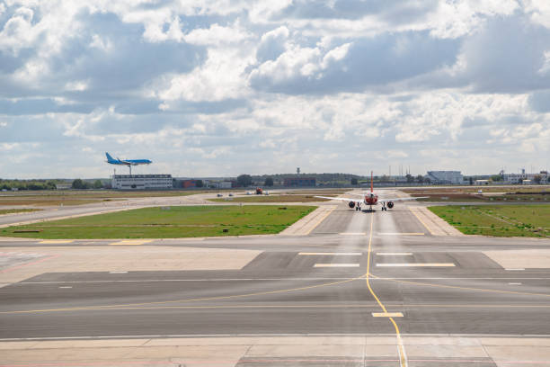 istock Plane low-cost drives up to airport building 1224800876
