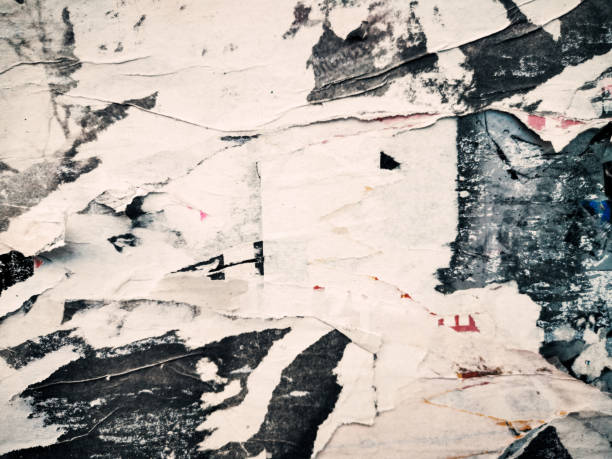 istock Old grunge ripped torn vintage posters creased crumpled paper surface texture background 1224802126